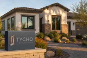 Finished Arizona home exterior showing newly installed energy-efficient replacement windows and desert landscaping curb appeal for the window replacement tax credit 2026
